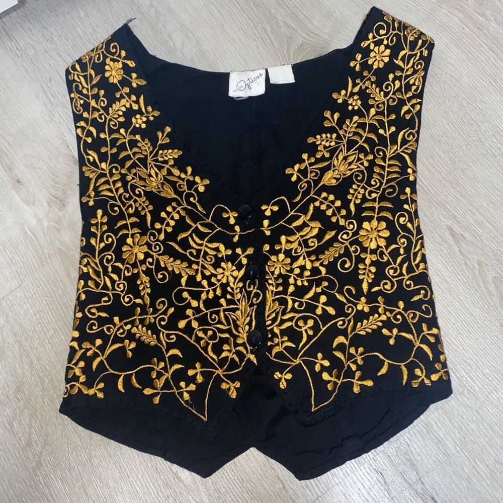 Gold and black vest